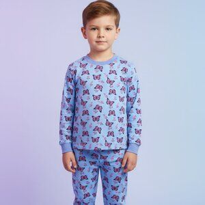 Blue Butterfly Kids Pajama Top – Back View with Cute Toys